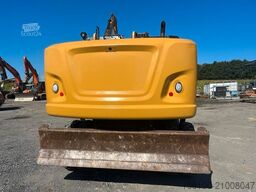 CATERPILLAR 320 F mit OilQuick 70/55 Rototiltsteuerung