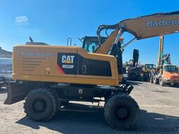 CATERPILLAR 320 F mit OilQuick 70/55 Rototiltsteuerung