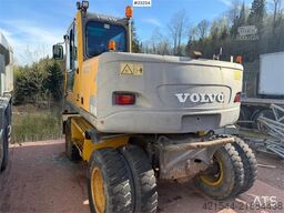 Volvo WE140B wheeled excavator with digging bucket