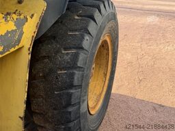 Volvo WE140B wheeled excavator with digging bucket