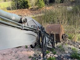 Volvo WE140B wheeled excavator with digging bucket