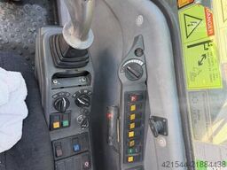 Volvo WE140B wheeled excavator with digging bucket