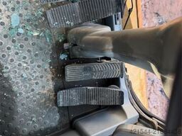 Volvo WE140B wheeled excavator with digging bucket