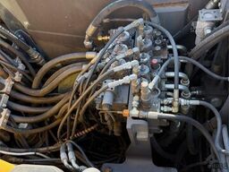 Volvo WE140B wheeled excavator with digging bucket