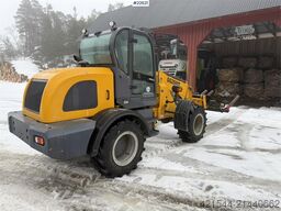 Günter Grossmann Ladowarka GG2500T telehandler with a bucket and l