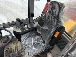 Günter Grossmann Ladowarka GG2500T telehandler with a bucket and l