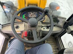Günter Grossmann Ladowarka GG2500T telehandler with a bucket and l