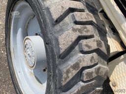 Genie GS4390 - 15,11m, diesel, 4x4