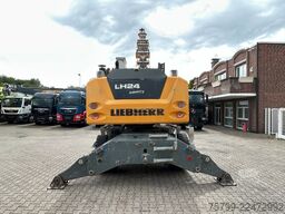 LIEBHERR LH 24 Litronic mit Abbruch- / Sortiergreifer