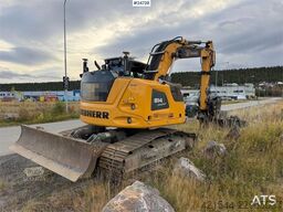 Liebherr R914 excavator with GPS, bucket, and tiltrotator.