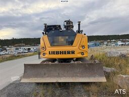 Liebherr R914 excavator with GPS, bucket, and tiltrotator.