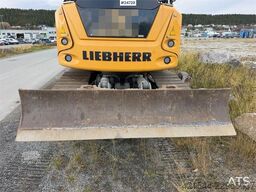 Liebherr R914 excavator with GPS, bucket, and tiltrotator.