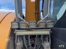Liebherr R914 excavator with GPS, bucket, and tiltrotator.