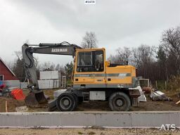 Åkerman EW130 wheel digger w/ a bucket. WATCH VIDEO