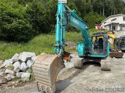 Kobelco Sk140SRLC-3 excavator equipped with a tooth bucket