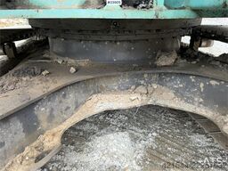 Kobelco Sk140SRLC-3 excavator equipped with a tooth bucket