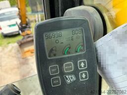 JCB JS145W wheeled machine with a cleaning bucket and