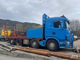 Scania R480 flatbed truck with manual loading ramps