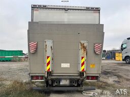 MAN TGL 12.210 4x2 box truck with full side opening