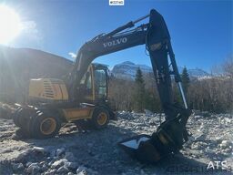 Volvo EW140B wheel digger w/ narrow bucket and rototilt.