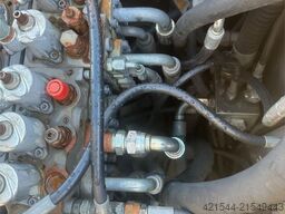 Volvo EW140B wheel digger w/ narrow bucket and rototilt.