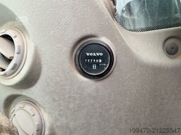 Volvo EC250DNL with 3 excavator buckets