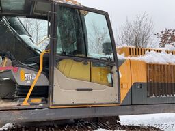 Volvo EC250DNL with 3 excavator buckets