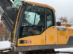 Volvo EC250DNL with 3 excavator buckets