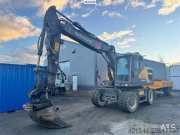 Volvo EW160E wheeled excavator with rototilt and two buc