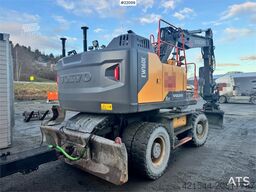 Volvo EW160E wheeled excavator with rototilt and two buc