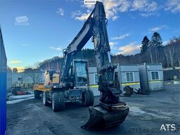 Volvo EW160E wheeled excavator with rototilt and two buc