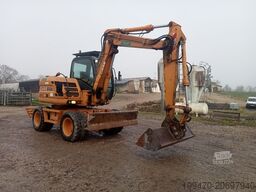 Case WX95 with 4 excavator buckets and forks