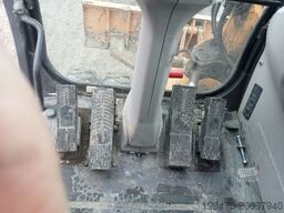 Case WX95 with 4 excavator buckets and forks