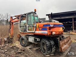 Fiat-Hitachi 150W.3 wheeled excavator with rototilt and grading