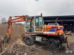 Fiat-Hitachi 150W.3 wheeled excavator with rototilt and grading