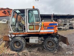 Fiat-Hitachi 150W.3 wheeled excavator with rototilt and grading