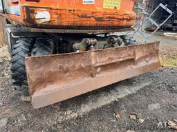 Fiat-Hitachi 150W.3 wheeled excavator with rototilt and grading