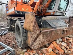 Fiat-Hitachi 150W.3 wheeled excavator with rototilt and grading