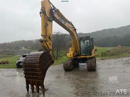 Caterpillar 315C Excavator with digging bucket, hydraulic grad