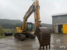 Caterpillar 315C Excavator with digging bucket, hydraulic grad