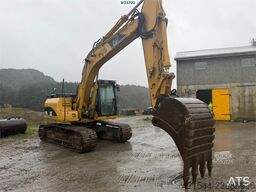 Caterpillar 315C Excavator with digging bucket, hydraulic grad