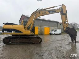 Caterpillar 315C Excavator with digging bucket, hydraulic grad