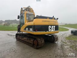 Caterpillar 315C Excavator with digging bucket, hydraulic grad