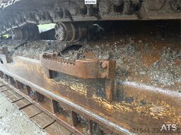Caterpillar 315C Excavator with digging bucket, hydraulic grad