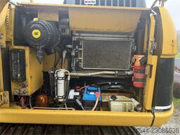 Caterpillar 315C Excavator with digging bucket, hydraulic grad