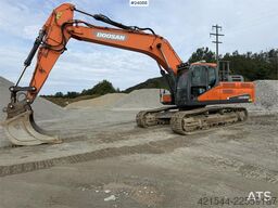 Doosan DX300 LC-5 excavator with digging bucket