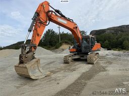 Doosan DX300 LC-5 excavator with digging bucket