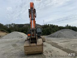 Doosan DX300 LC-5 excavator with digging bucket