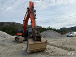 Doosan DX300 LC-5 excavator with digging bucket
