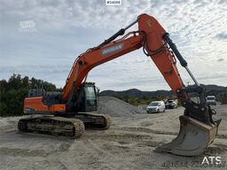 Doosan DX300 LC-5 excavator with digging bucket